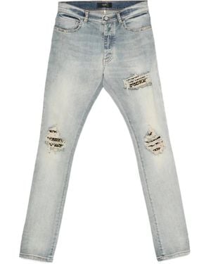 Amiri Vaqueros Envejecidos Con Apliques - Gris