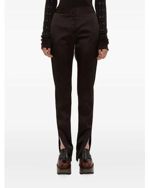 Olivier Theyskens Pantalones con abertura en el dobladillo - Negro