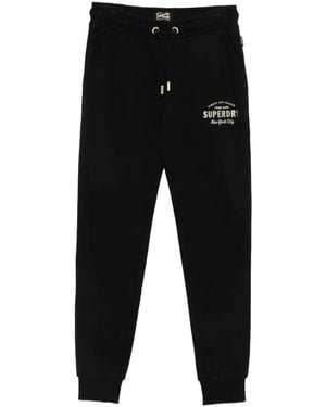 Superdry Pantalones de chándal con logo bordado - Negro