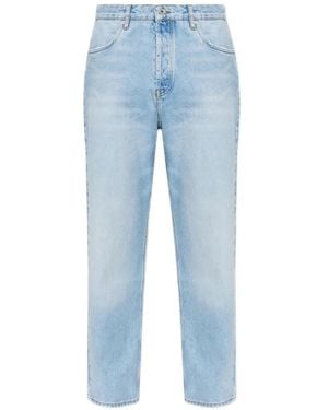 Studio Nicholson Bleached-Wash Distressed Jeans - Blue