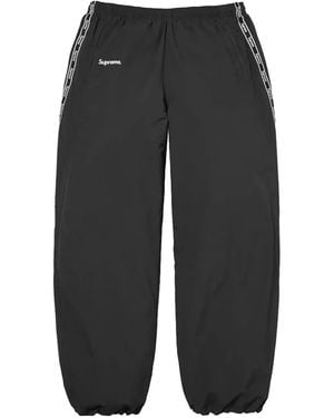 Supreme Pantalones De Chándal Con Franjas Del Logo - Negro