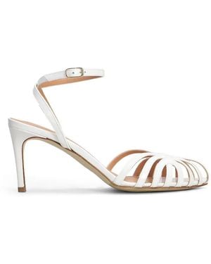 The Seller Patent-Finish Caged Sandals - White