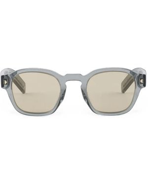Prada Sunglasses With The Iconic Metal Plaque - Grey