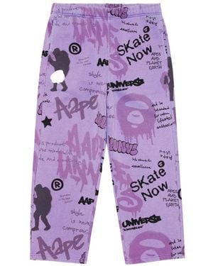 Aape By A Bathing Ape Aapeunvs Moonface Graffiti-Print Track Pants - Purple