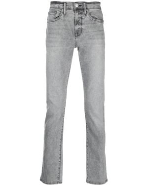 FRAME Tief Sitzende Skinny-Jeans - Grau