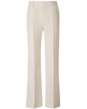 KHAITE Pressed-Crease Slit-Hem Pants - White