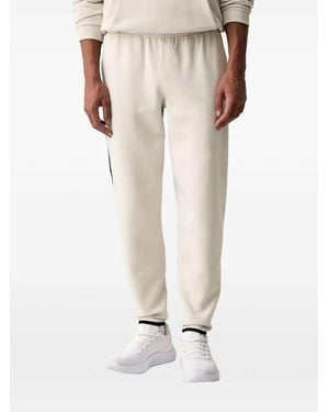 Under Armour Unstoppable Fleece Logo-Plaque Track Trousers - Natural