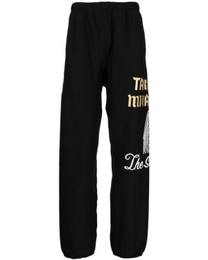 TAKAHIROMIYASHITA TheSoloist. Pantalones de chándal con logo lateral - Negro