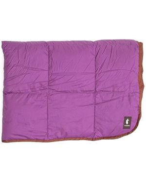 COTOPAXI Gesteppter Poncho - Lila
