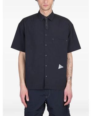 and wander Logo-Print Shirt - Blue
