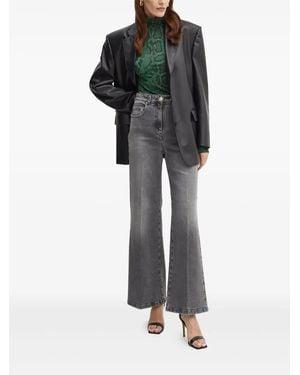 SIMONA CORSELLINI Jeans Mit Logo-Schild - Schwarz