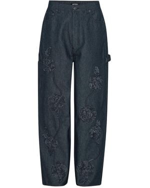 ROTATE BIRGER CHRISTENSEN Vaqueros con rosa bordada y cinco bolsillos - Azul