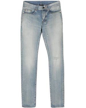 Saint Laurent Vaqueros skinny rasgados - Azul