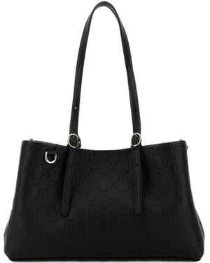Gucci Monogram-Embossed Shoulder Bag - Black