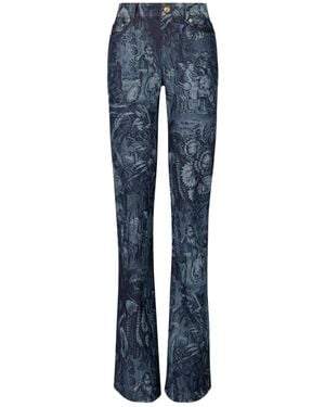 Tory Burch Vaqueros acampanados con motivo estampado - Azul