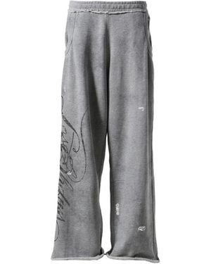 LOSTSHDWS Distressed-Script Track Trousers - Grey