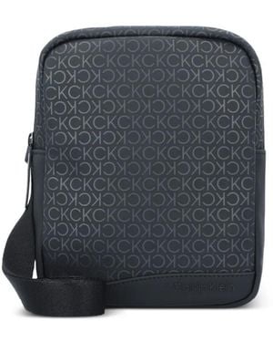 Calvin Klein Monogram-Embossed Shoulder Bag - Blue