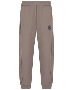 Giorgio Armani Pantalones de chándal con logo bordado - Gris