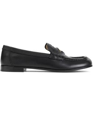 Miu Miu Mocasines con detalle de moneda - Negro