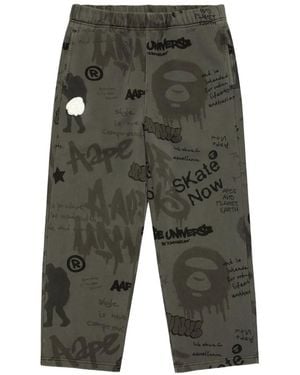 Aape By A Bathing Ape Moonface Graffiti-Print Track Pants - Green