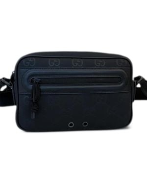 Gucci Kuriertasche mit eingeprägtem Monogramm - Schwarz