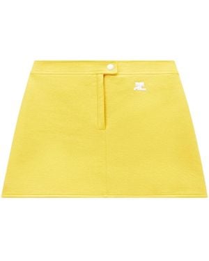 Courreges Minirock mit Logo-Patch - Gelb