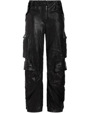 Dolce & Gabbana Pantalones de piel con bolsillos cargos - Negro