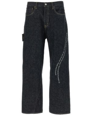 Undercover People Have The Power Embroidered Curved-Stitch Jeans - Black