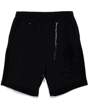 MASTERMIND WORLD Cut-Off Track Shorts - Black