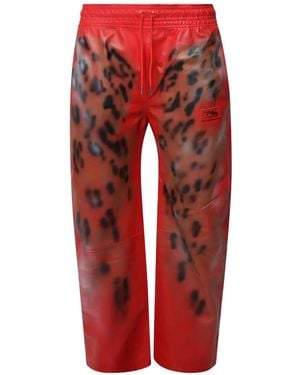 La Maskarade Animal-Print Leather Track Trousers - Red