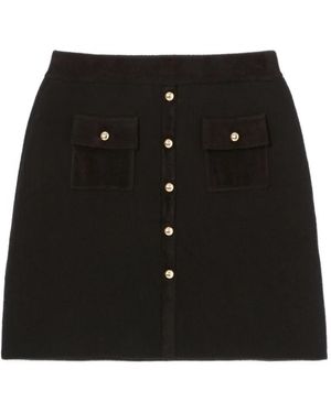 Claudie Pierlot Minirock aus geripptem Strick - Schwarz