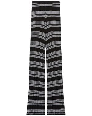 Claudie Pierlot Pantalones slim a rayas - Negro