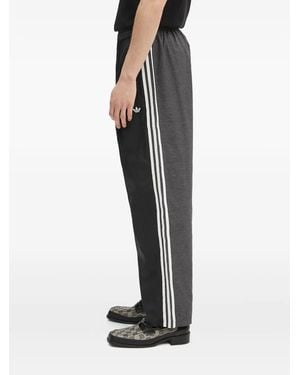 adidas Three-stripes Paneled Track Pants - Black