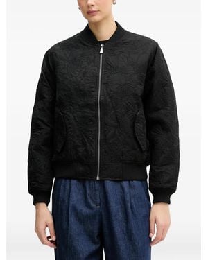 Sisley Plumífero con motivo floral - Negro