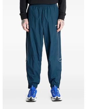 Nike Pantalones de chándal con logo Swoosh - Azul