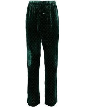 Gucci Pantalones de terciopelo con logo GG - Verde