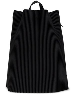 Black Homme Plissé Issey Miyake Backpacks for Men | Lyst