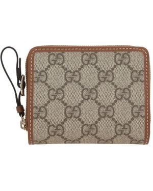 Gucci Cartera con monograma GG y cremallera - Gris