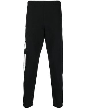 Heron Preston Pantalones de chándal con parche del logo - Negro