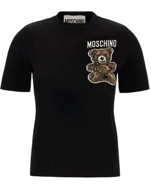 Tシャツ・カットソー MOSCHINO Women Tops 070805411555 Black 22384913_52355407_600.jpg