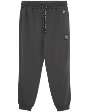 KTZ Pantalon À Logo Embossé - Grey