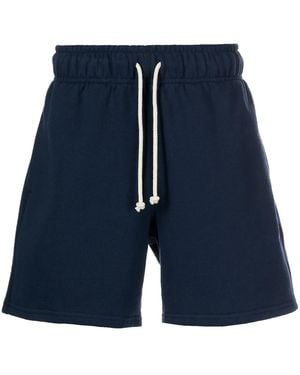 New Balance Pantalones cortos de deporte por la rodilla - Azul