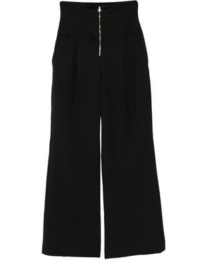 Thelatest Pantalones ajustados con cremallera - Negro