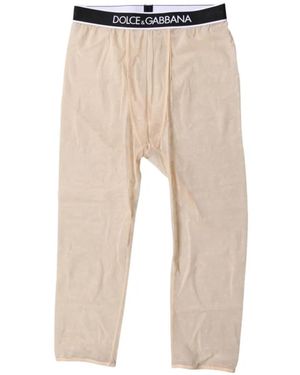 Dolce & Gabbana Logo-Embossed Sheer-Finish Leggings - Natural
