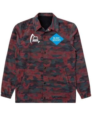 Undercover Bloody Geekers Camouflage-Print Graphic-Detail Coach Jacket - Red