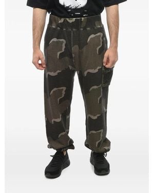 Undercover X Eastpak Camouflage-Print Cotton Track Trousers - Black