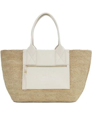【Ganni】 Faux leather-trimmed raffia tote bag Faux leather-trimmed raffia tote bag in beige - Ganni