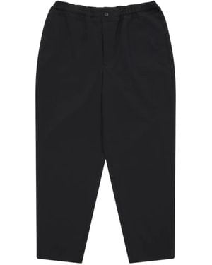 COMME DES GARÇON BLACK Elasticated-Waistband Tapered Pants - Black
