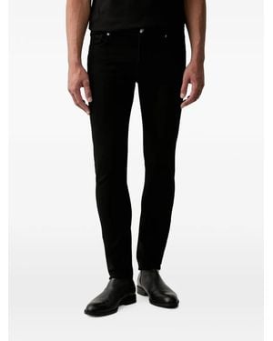 Guess Logo-Patch Slim-Fit Jeans - Black