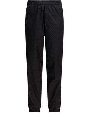 McQueen Pantalones de chándal con calavera en jacquard - Negro